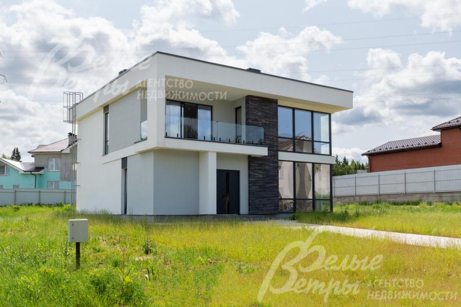 Новый дом стиле хай-тэк на участке 15 соток в охраняемом коттеджном поселке в районе деревни Шаганино.