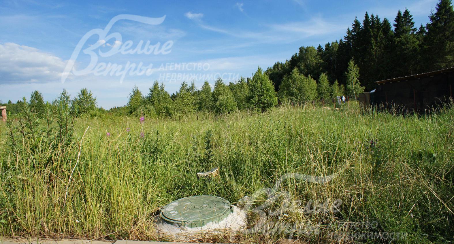 Участок в коттеджном поселке с центральными коммуникациями