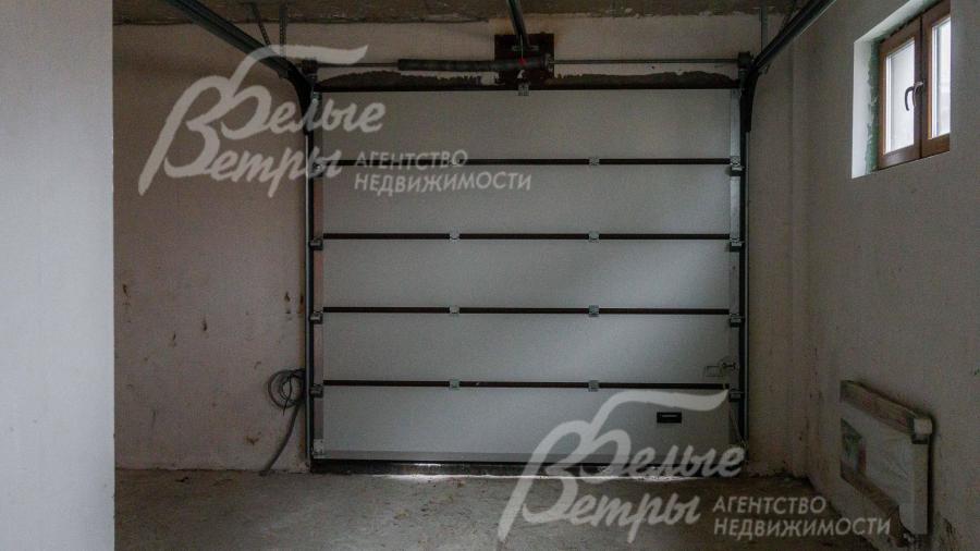 Гаражные ворота автоматические секционные 2,8х2,5h с низким подъемом. TORRUS