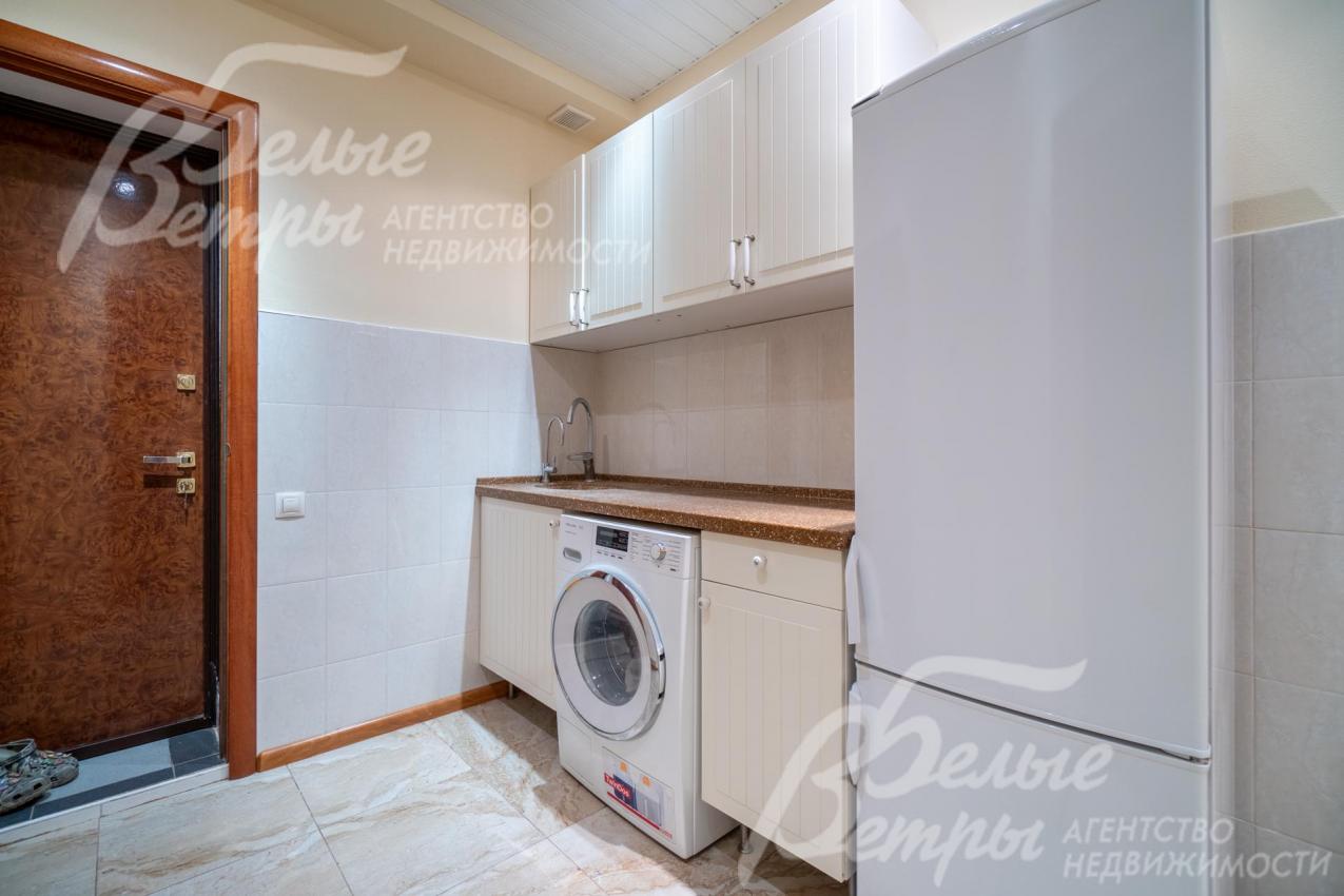 Постирочная: установлена стиральная машина Miele