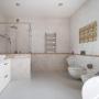Сантехника белая Laufen, смесители Hansgrohe