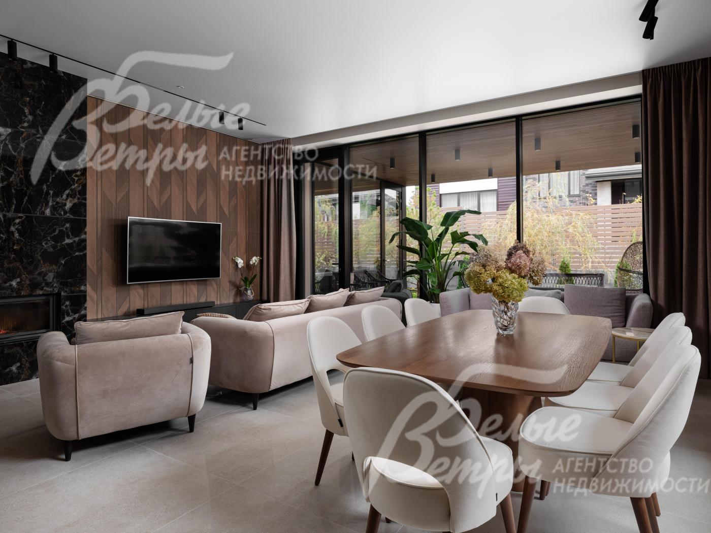 В зоне столовой установлена обеденная группа на 8 персон