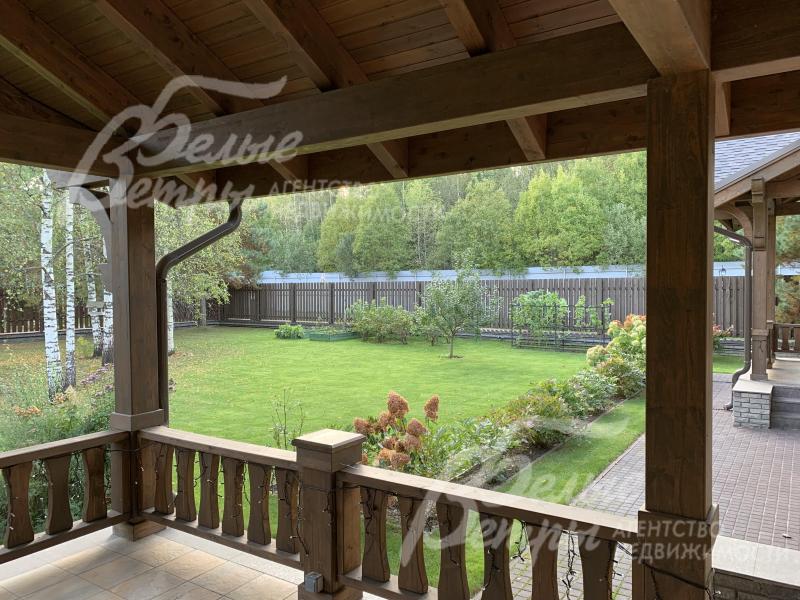 Вид с террасы на участок