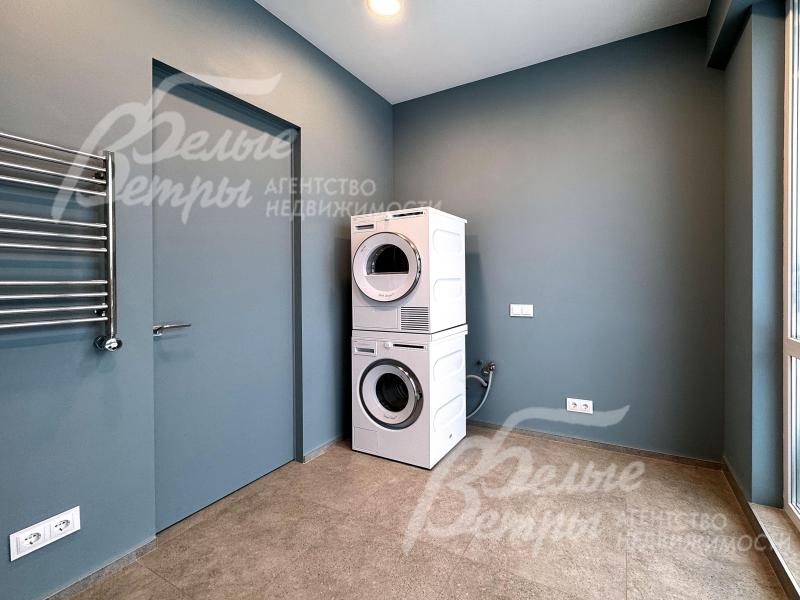Оборудованная постирочная комната